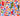 Colorful pattern of parrots and tropical leaves on a white background